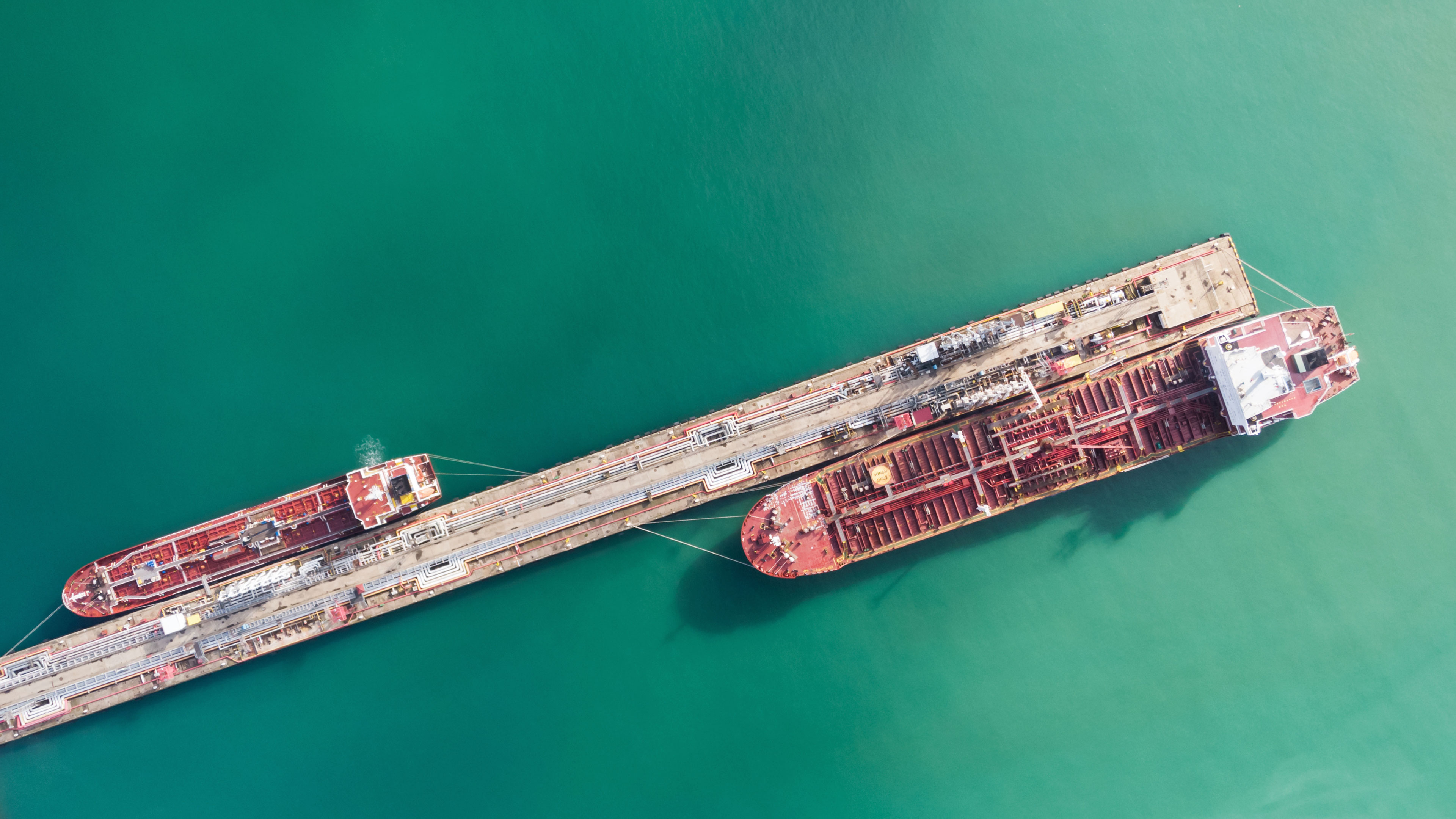 Aerial view of berth with two oil tankers